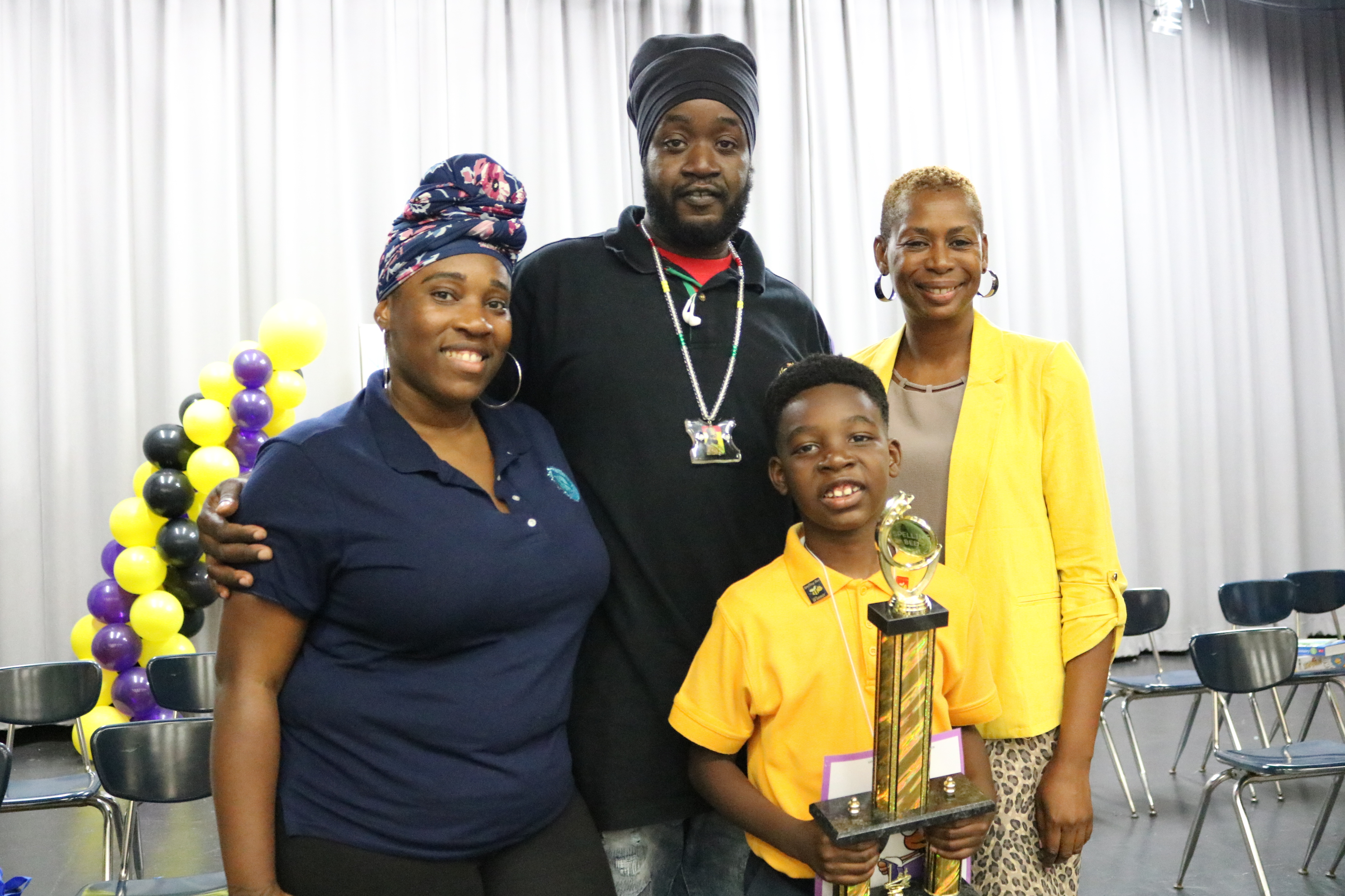 Cairo Leonard with parents and coach.JPG