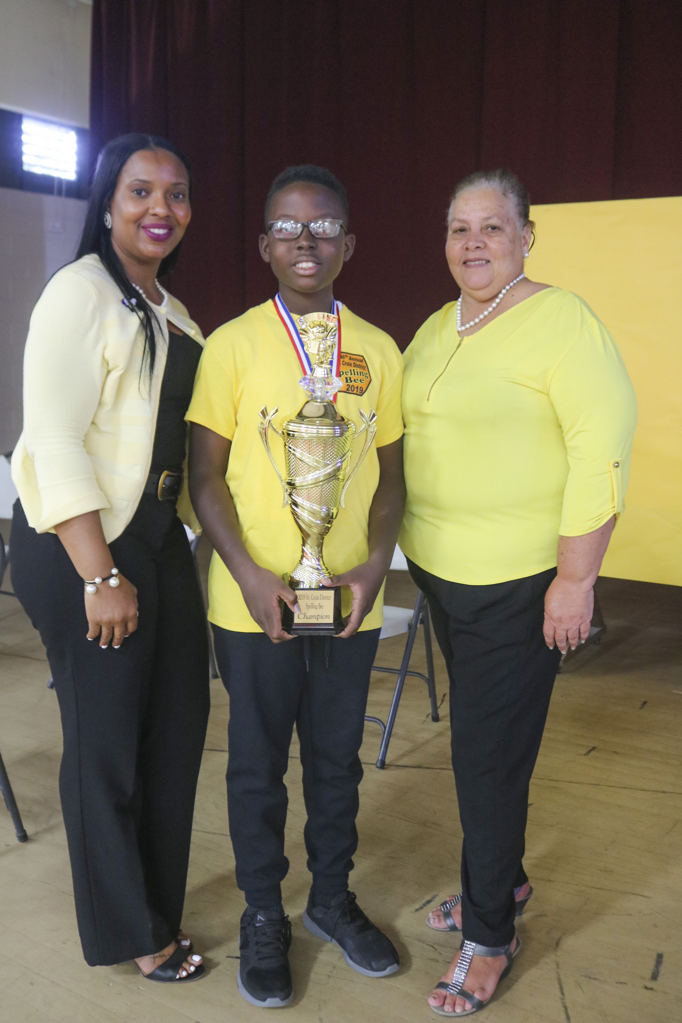 STX District Acting Deputy Superintendent Dr. Carla Bastian; STX District Spelling Bee Winner Michael Atwell and STX District Acting Insular Superintendent Maria Encarnacion.jpg