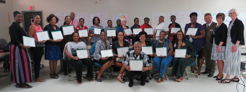 Trained facilitators posed with instructors.jpg