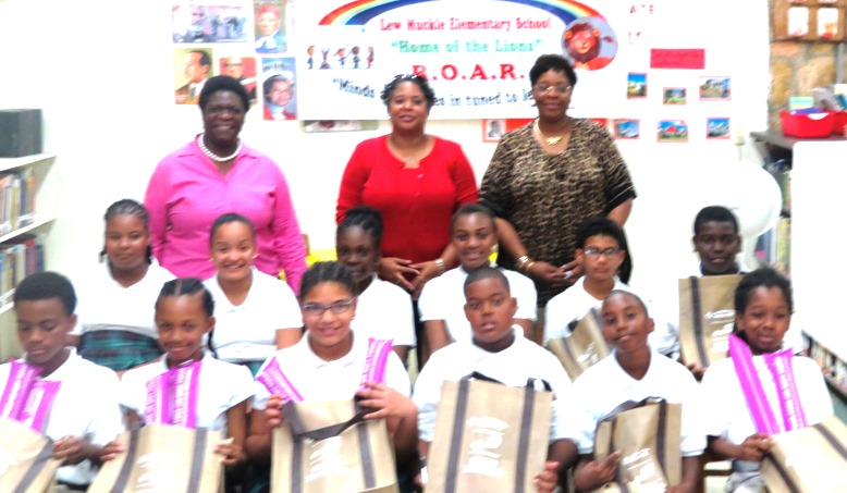 Muckle CyberPatriot inductees show off bags donated by Innovative.jpg